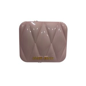 Miu Miu pink compact dual sided mirror.